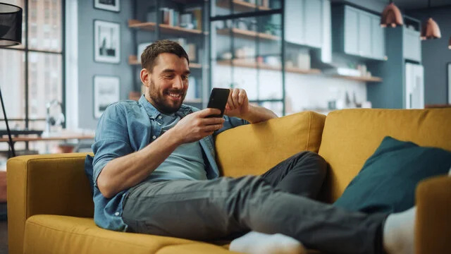 Person feeling lonely finding connection through Loqui Listening app